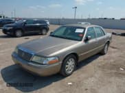 ✅ 2005 Mercury Grand Marquis LS Premium • VIN: 2MEFM75W35X634818 • Lot: 42937860. Listed on IAAI with 187,903 mi. Free auction sales archive from the USA and detailed vehicle history report at DreamBid. Image 2.