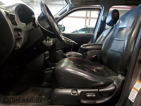 ✅ 2003 Ford Escape Limited • VIN: 1FMCU94143KC06029 • Lot: 58979025. Listed on Copart with 185,200 mi. Free auction sales archive from the USA and detailed vehicle history report at DreamBid. Image 7.