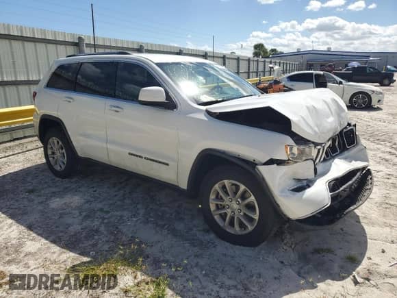2021 Jeep Grand Cherokee Laredo E с VIN 1C4RJEAG3MC783915, выставлен на аукционе Copart как лот 82524365 с пробегом 82 076 миль миль и На запчасти • Non repairable. История ставок и продаж доступна на DreamBid. Изображение 4.