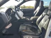 ✅ 2014 Porsche Cayenne S • VIN: WP1AB2A28ELA56170 • Lot: 90845585. Listed on Copart with 177,461 mi. Free auction sales archive from the USA and detailed vehicle history report at DreamBid. Image 7.