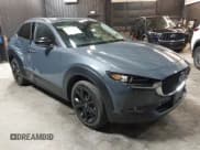✅ 2022 Mazda CX-30 S Carbon Edition • VIN: 3MVDMBCL8NM447234 • Lot: 42511600. Listed on IAAI with 51,926 mi. Free auction sales archive from the USA and detailed vehicle history report at DreamBid. Image 1.
