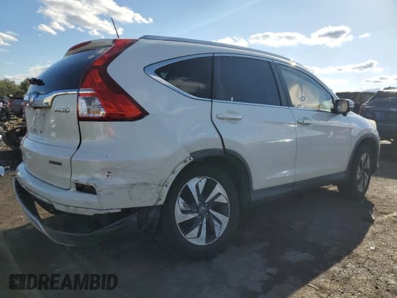 ✅ 2015 Honda CR-V Touring • VIN: 5J6RM4H91FL024704 • Lot: 84038285. Listed on Copart with 111,854 mi. Free auction sales archive from the USA and detailed vehicle history report at DreamBid. Image 3.