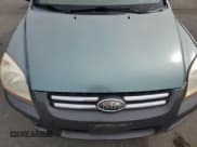 ✅ 2006 Kia Sportage LX • VIN: KNDJF723667182905 • Лот: 81348695. Опубликован ранее на Copart с пробегом 83 805 миль. Бесплатный доступ к архиву аукционных продаж из США и подробный отчёт об истории автомобиля на DreamBid. Изображение 12.