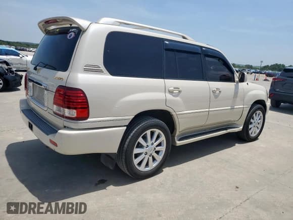 ✅ 2004 Lexus LX 470 • VIN: JTJHT00W143537038 • Lot: 65534355. Listed on Copart with 214,894 mi. Free auction sales archive from the USA and detailed vehicle history report at DreamBid. Image 3.
