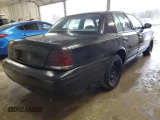 ✅ 1999 Ford Crown Victoria Police • VIN: 2FAFP71W7XX105850 • Лот: 43760905. Опубликован ранее на Copart с пробегом 308 252 миль. Бесплатный доступ к архиву аукционных продаж из США и подробный отчёт об истории автомобиля на DreamBid. Изображение 3.