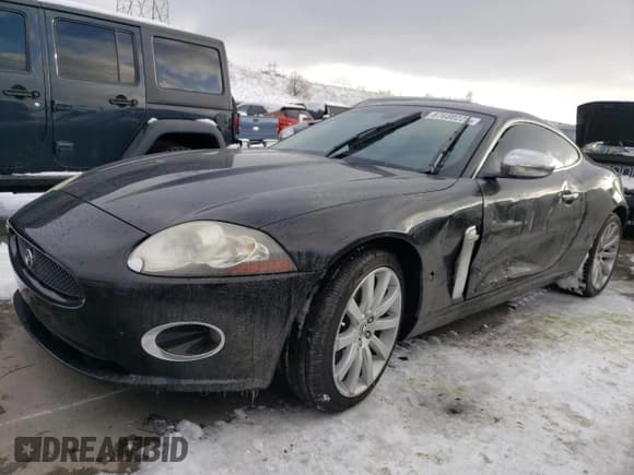 ✅ 2008 Jaguar XK • VIN: SAJWA43B485B24545 • Lot: 87680225. Listed on Copart with 133,055 mi. Free auction sales archive from the USA and detailed vehicle history report at DreamBid. Image 1.