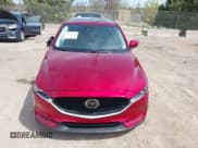 ✅ 2020 Mazda CX-5 Touring • VIN: JM3KFBCM2L0846174 • Lot: 42203758. Wystawiony na IAAI z przebiegiem 58 617 mil. Bezpłatny archiwum sprzedaży aukcyjnych z USA i szczegółowy raport historii pojazdu na DreamBid. Zdjęcie 12.