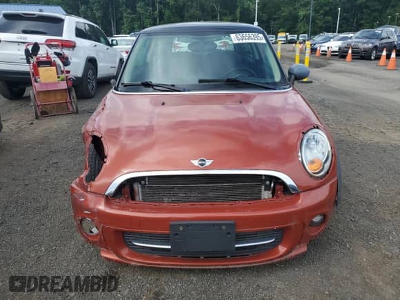 2012 MINI Hardtop with VIN WMWSU3C53CT260060, listed as a Copart auction lot 63656395 with 100,537 mi miles and Clean title. Bid and sale history available at DreamBid. Image 5.