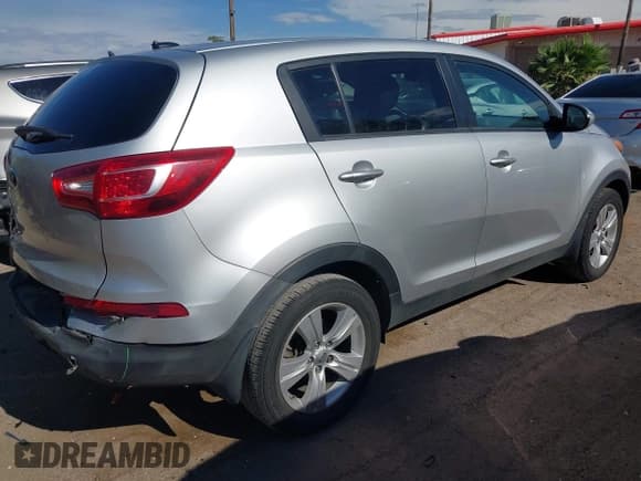 ✅ 2013 Kia Sportage LX • VIN: KNDPB3A29D7506689 • Lot: 42997992. Listed on IAAI with 118,130 mi. Free auction sales archive from the USA and detailed vehicle history report at DreamBid. Image 4.