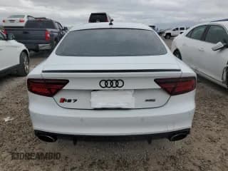 ✅ 2016 Audi RS 7 Prestige • VIN: WUAW2BFC1GN902562 • Лот: 57022995. Опубликован ранее на Copart с пробегом 74 433 миль. Бесплатный доступ к архиву аукционных продаж из США и подробный отчёт об истории автомобиля на DreamBid. Изображение 6.