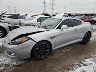 2008 Hyundai Tiburon GS z VIN KMHHM66D48U292160, wystawiony jako Copart lot #84760964 z przebiegiem 114 878 mil mil oraz Szkoda całkowita • Salvage title. Historia ofert i sprzedaży dostępna na DreamBid. Obrazek 1.
