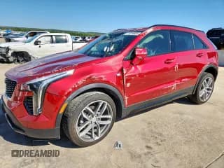 ✅ 2023 Cadillac XT4 FWD Sport • VIN: 1GYFZER49PF107195 • Лот: 71216655. Опубликован ранее на Copart с пробегом 13 861 миль. Бесплатный доступ к архиву аукционных продаж из США и подробный отчёт об истории автомобиля на DreamBid. Изображение 1.