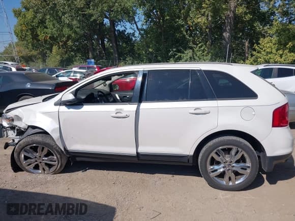 ✅ 2012 Ford Edge SEL • VIN: 2FMDK4JC0CBA55459 • Lot: 43202337. Listed on IAAI with 164,054 mi. Free auction sales archive from the USA and detailed vehicle history report at DreamBid. Image 13.
