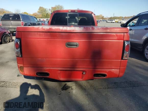 1999 Dodge Dakota Sport z VIN 1B7GL22Z4XS276158, wystawiony jako Copart lot #76972714 z przebiegiem 159 628 mil mil oraz Szkoda całkowita • Salvage title. Historia ofert i sprzedaży dostępna na DreamBid. Obrazek 6.