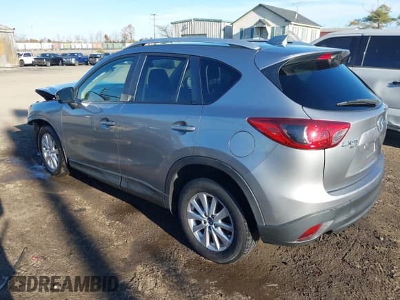✅ 2014 Mazda CX-5 Touring • VIN: JM3KE4CY3E0393283 • Lot: 43686574. Wystawiony na IAAI z przebiegiem 122 569 mil. Bezpłatny archiwum sprzedaży aukcyjnych z USA i szczegółowy raport historii pojazdu na DreamBid. Zdjęcie 3.