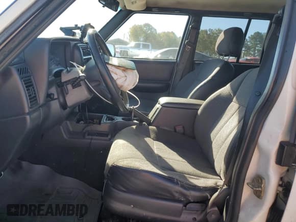 ✅ 1999 Jeep Cherokee Sport • VIN: 1J4FT68S8XL536398 • Lot: 87068025. Listed on Copart with Not provided. Free auction sales archive from the USA and detailed vehicle history report at DreamBid. Image 7.