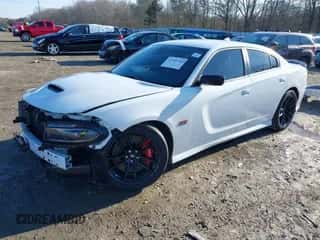 2023 Dodge Charger Scat Pack with VIN 2C3CDXGJ4PH626959, listed as a IAAI auction lot 41448760 with 13,201 mi miles and . Bid and sale history available at DreamBid. Image 2.