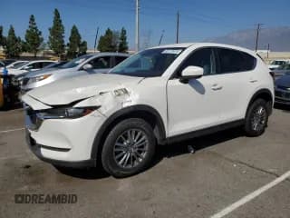 ✅ 2017 Mazda CX-5 Touring • VIN: JM3KFACL0H0133220 • Lot: 85173615. Wystawiony na Copart z przebiegiem 217 137 mil. Bezpłatny archiwum sprzedaży aukcyjnych z USA i szczegółowy raport historii pojazdu na DreamBid. Zdjęcie 1.