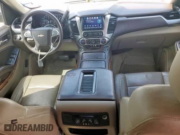 2016 Chevrolet Tahoe LTZ с VIN 1GNSKCKC6GR264493, выставлен на аукционе Copart как лот 84283015 с пробегом 142 412 миль миль и Списание • Salvage title. История ставок и продаж доступна на DreamBid. Изображение 8.