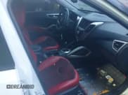 ✅ 2012 Hyundai Veloster w/Gray Int • VIN: KMHTC6AD1CU057986 • Lot: 41551354. Wystawiony na IAAI z przebiegiem 151 299 mil. Bezpłatny archiwum sprzedaży aukcyjnych z USA i szczegółowy raport historii pojazdu na DreamBid. Zdjęcie 5.