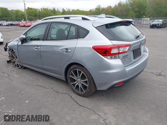 ✅ 2018 Subaru Impreza Limited • VIN: 4S3GTAT65J3731857 • Lot: 42199163. Listed on IAAI with 62,621 mi. Free auction sales archive from the USA and detailed vehicle history report at DreamBid. Image 3.