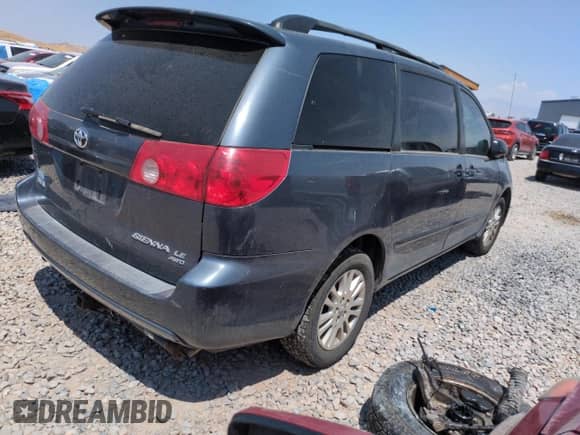 2009 Toyota Sienna LE with VIN 5TDBK23C09S023602, listed as a Copart auction lot 65241605 with 214,661 mi miles and Clean title. Bid and sale history available at DreamBid. Image 3.