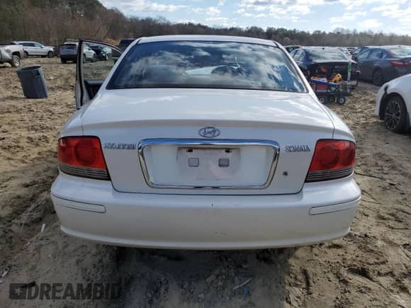 2004 Hyundai Sonata z VIN KMHWF25SX4A041939, wystawiony jako Copart lot #83595624 z przebiegiem 143 228 mil mil oraz Szkoda całkowita • Salvage title. Historia ofert i sprzedaży dostępna na DreamBid. Obrazek 6.