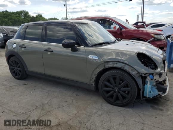 ✅ 2020 MINI Hardtop 4 Door Cooper S • VIN: WMWXU9C05L2L96631 • Lot: 56916914. Listed on Copart with 85,950 mi. Free auction sales archive from the USA and detailed vehicle history report at DreamBid. Image 4.