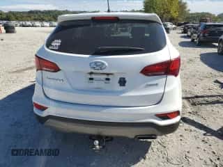 2018 Hyundai Santa Fe 2.4L z VIN 5NMZT3LBXJH077926, wystawiony jako Copart lot #86124935 z przebiegiem 193 067 mil mil oraz Szkoda całkowita • Salvage title. Historia ofert i sprzedaży dostępna na DreamBid. Obrazek 6.