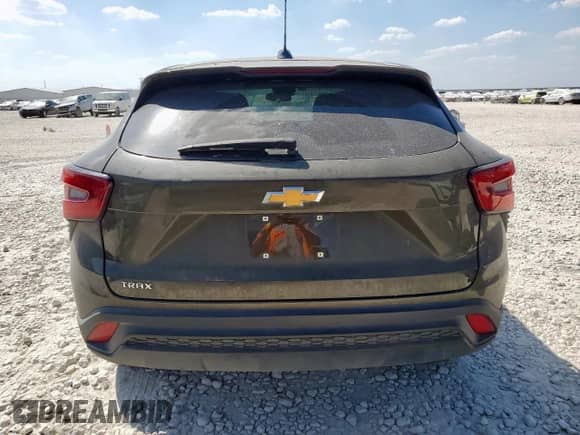 2024 Chevrolet Trax LS с VIN KL77LFE2XRC114759, выставлен на аукционе Copart как лот 85110195 с пробегом 43 627 миль миль и Списание • Salvage title. История ставок и продаж доступна на DreamBid. Изображение 6.