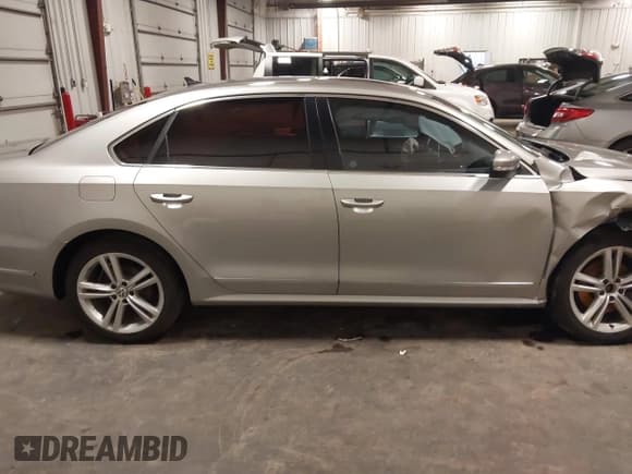 ✅ 2013 Volkswagen Passat SEL Premium • VIN: 1VWCN7A37DC092760 • Lot: 42963701. Listed on IAAI with 100,420 mi. Free auction sales archive from the USA and detailed vehicle history report at DreamBid. Image 14.