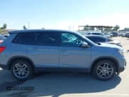 ✅ 2022 Honda Passport EX-L • VIN: 5FNYF7H52NB002772 • Lot: 42322827. Listed on IAAI with 55,798 mi. Free auction sales archive from the USA and detailed vehicle history report at DreamBid. Image 14.