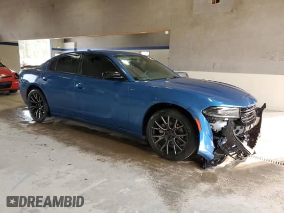 2023 Dodge Charger SXT with VIN 2C3CDXBG6PH631740, listed as a Copart auction lot 82060835 with 31,174 mi miles and Clean title. Bid and sale history available at DreamBid. Image 4.