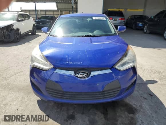 2014 Hyundai Veloster z VIN KMHTC6AD5EU216494, wystawiony jako Copart lot #71566224 z przebiegiem 87 961 mil mil oraz Szkoda całkowita • Salvage title. Historia ofert i sprzedaży dostępna na DreamBid. Obrazek 5.