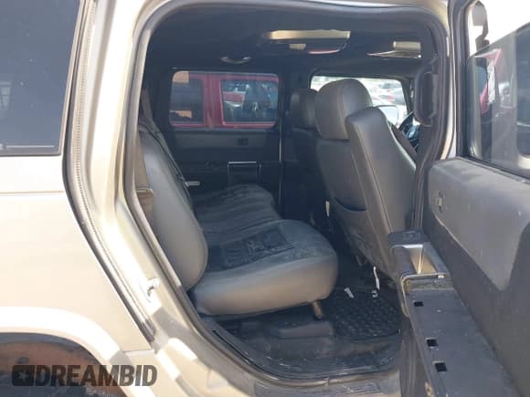 ✅ 2004 Hummer H2 • VIN: 5GRGN23U34H105809 • Lot: 42456055. Listed on IAAI with Not provided. Free auction sales archive from the USA and detailed vehicle history report at DreamBid. Image 8.