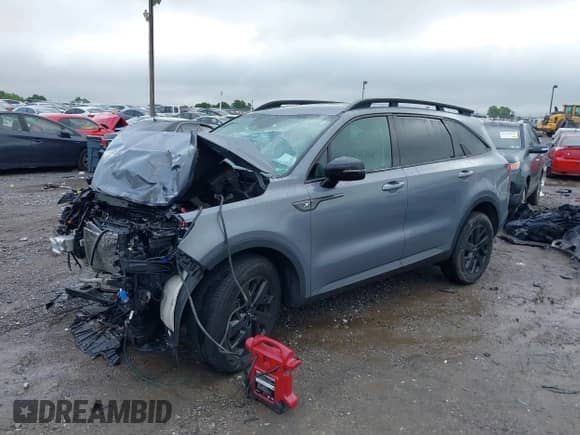 2022 Kia Sorento X-Line S z VIN 5XYRLDLC1NG085105, wystawiony jako IAAI lot #42375855 z przebiegiem 43 182 mil mil oraz . Historia ofert i sprzedaży dostępna na DreamBid. Obrazek 2.