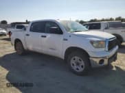 ✅ 2010 Toyota Tundra • VIN: 5TFDY5F1XAX135700 • Lot: 71306805. Listed on Copart with 294,113 mi. Free auction sales archive from the USA and detailed vehicle history report at DreamBid. Image 4.