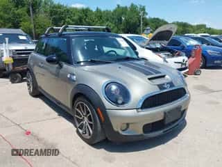 2009 MINI Hardtop S with VIN WMWMF73529TX40576, listed as a IAAI auction lot 42462085 with 77,936 mi miles and . Bid and sale history available at DreamBid. Image 1.
