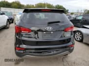 ✅ 2018 Hyundai Santa Fe 2.4L • VIN: 5NMZTDLB3JH077563 • Лот: 65330622. Опубликован ранее на Copart с пробегом 65 169 миль. Бесплатный доступ к архиву аукционных продаж из США и подробный отчёт об истории автомобиля на DreamBid. Изображение 6.