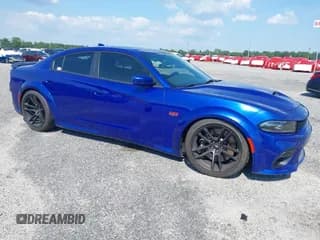 ✅ 2022 Dodge Charger Scat Pack Widebody • VIN: 2C3CDXGJ0NH176255 • Lot: 39576763. Wystawiony na IAAI z przebiegiem 18 324 mil. Bezpłatny archiwum sprzedaży aukcyjnych z USA i szczegółowy raport historii pojazdu na DreamBid. Zdjęcie 1.