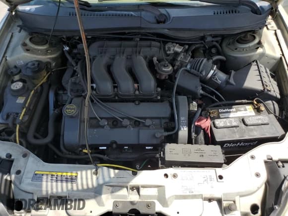 ✅ 2003 Mercury Sable LS Premium • VIN: 1MEFM55S23A617225 • Lot: 52021765. Listed on Copart with 131,291 mi. Free auction sales archive from the USA and detailed vehicle history report at DreamBid. Image 13.