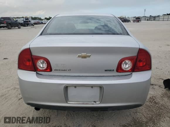2010 Chevrolet Malibu 1LT z VIN 1G1ZC5E07AF323909, wystawiony jako Copart lot #56308914 z przebiegiem 169 154 mil mil oraz Szkoda całkowita • Salvage title. Historia ofert i sprzedaży dostępna na DreamBid. Obrazek 6.
