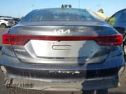 ✅ 2023 Kia Forte LXS • VIN: 3KPF24AD6PE647341 • Lot: 43346999. Listed on IAAI with 56,441 mi. Free auction sales archive from the USA and detailed vehicle history report at DreamBid. Image 17.