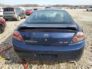 2008 Hyundai Tiburon GT z VIN KMHHN66F08U288041, wystawiony jako Copart lot #48870495 z przebiegiem 212 039 mil mil oraz Czysty tytuł • Clean title. Historia ofert i sprzedaży dostępna na DreamBid. Obrazek 6.