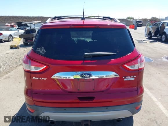 ✅ 2015 Ford Escape Titanium • VIN: 1FMCU0J93FUC89385 • Lot: 42328729. Listed on IAAI with 84,495 mi. Free auction sales archive from the USA and detailed vehicle history report at DreamBid. Image 17.