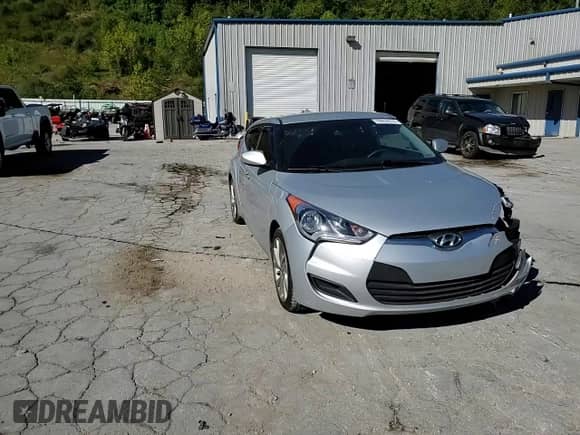 2016 Hyundai Veloster z VIN KMHTC6AD9GU269041, wystawiony jako Copart lot #70952574 z przebiegiem 146 798 mil mil oraz Szkoda całkowita • Salvage title. Historia ofert i sprzedaży dostępna na DreamBid. Obrazek 11.