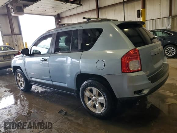 ✅ 2013 Jeep Compass Sport • VIN: 1C4NJCBA8DD283594 • Лот: 92950365. Опубликован ранее на Copart с пробегом 98 732 миль. Бесплатный доступ к архиву аукционных продаж из США и подробный отчёт об истории автомобиля на DreamBid. Изображение 2.