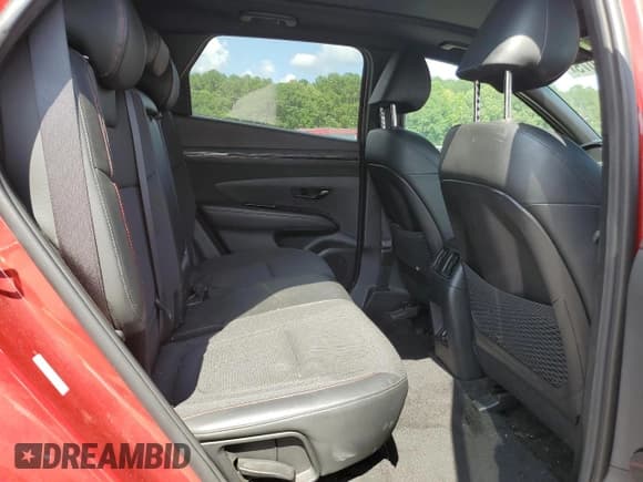 ✅ 2023 Hyundai Tucson N Line • VIN: KM8JF3AE9PU200209 • Lot: 63095075. Wystawiony na Copart z przebiegiem 43 801 mil. Bezpłatny archiwum sprzedaży aukcyjnych z USA i szczegółowy raport historii pojazdu na DreamBid. Zdjęcie 10.