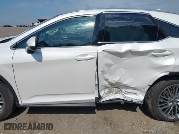 ✅ 2022 Lexus RX 450h • VIN: 2T2JGMDA7NC085504 • Lot: 42201846. Listed on IAAI with 47,659 mi. Free auction sales archive from the USA and detailed vehicle history report at DreamBid. Image 14.