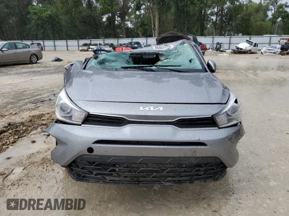 ✅ 2023 Kia Rio S • VIN: 3KPA24AD0PE518859 • Lot: 86060205. Listed on Copart with Not provided. Free auction sales archive from the USA and detailed vehicle history report at DreamBid. Image 5.